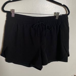 Black workout shorts with biker shorts build in- size X-large